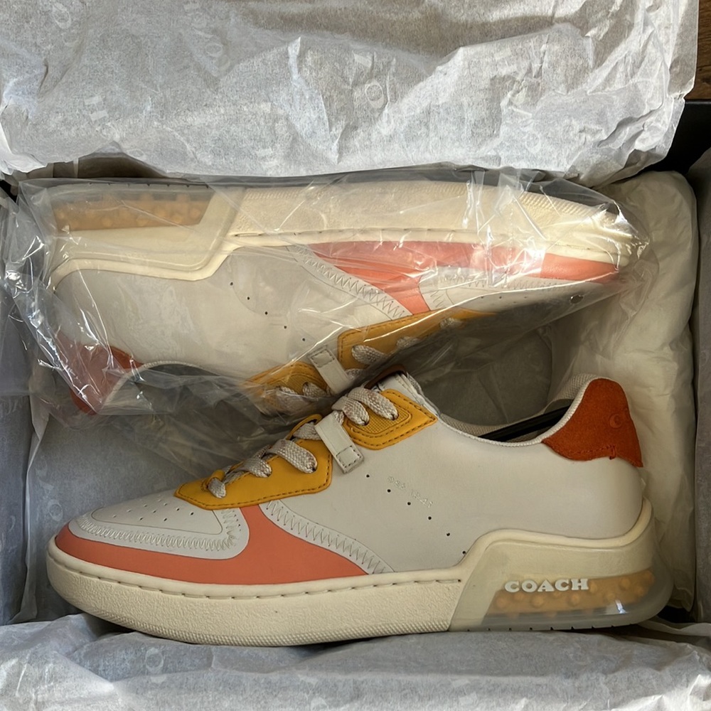Coach custom sneakers. size 8. Never worn. Pink, Orange, yellow.